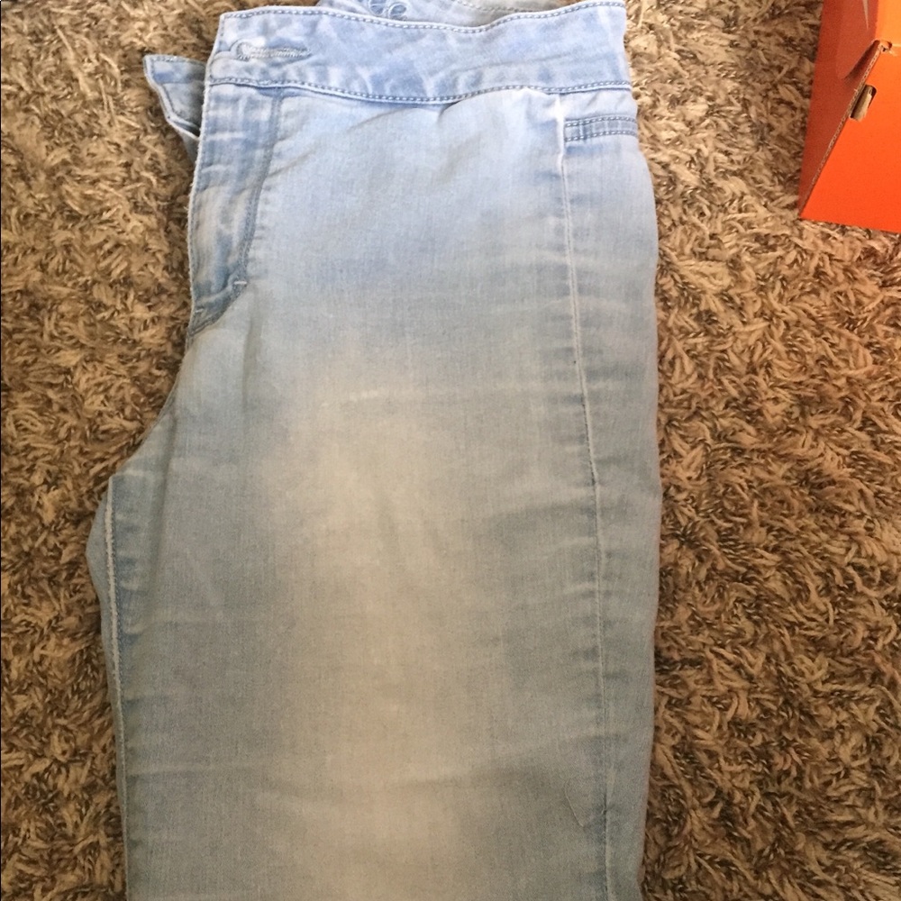 High waisted light blue jeans